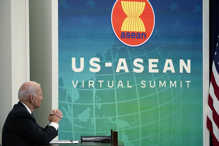 In this file photo, President Joe Biden participates virtually in the U.S.-ASEAN Summit from the South Court Auditorium on the White House complex in Washington, Tuesday, Oct. 26, 2021. 
Mr. Biden will host leaders of the Association of Southeast Asian Nations (ASEAN) for a summit in Washington next month, the White House announced on Saturday. (AP Photo/Susan Walsh)   **FILE**