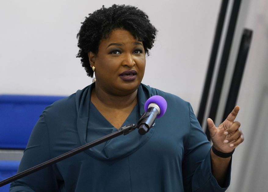 Stacey Abrams speaks during a church service in Norfolk, Va., Sunday, Oct. 17, 2021. A political organization led by the Democratic titan is branching out into paying off medical debts. Fair Fight Action on Wednesday, Oct. 27 told The Associated Press that it is donating $1.34 million from its political action committee to wipe out debt owed by 108,000 people in Georgia, Arizona, Louisiana, Mississippi and Alabama.   (AP Photo/Steve Helber, File)