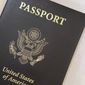 This May 25, 2021, file photo shows a U.S. Passport cover in Washington. The United States has issued its first passport with an “X” gender designation, a milestone in the recognition of the rights of people who don&#x27;t identify as male or female. (AP Photo/Eileen Putman)