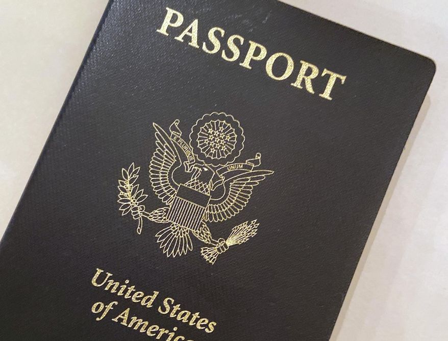 This May 25, 2021, file photo shows a U.S. Passport cover in Washington. The United States has issued its first passport with an “X” gender designation, a milestone in the recognition of the rights of people who don&#39;t identify as male or female. (AP Photo/Eileen Putman)