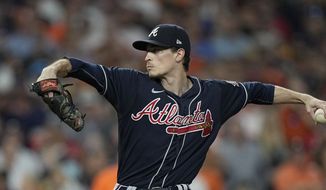 Atlanta Braves starting pitcher Max Fried throws during the first inning in Game 2 of baseball&#x27;s World Series between the Houston Astros and the Atlanta Braves Wednesday, Oct. 27, 2021, in Houston. (AP Photo/David J. Phillip) **FILE**