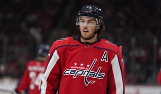 Washington Capitals right wing T.J. Oshie (77) in action in the first period of an NHL hockey game against the Detroit Red Wings, Wednesday, Oct. 27, 2021, in Washington. (AP Photo/Alex Brandon)