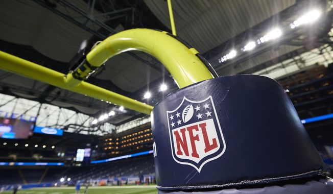 In this Aug. 13, 2021, file photo, an NFL logo is displayed on a goal post pad during an NFL preseason football game between the Buffalo Bills and Detroit Lions in Detroit. (AP Photo/Rick Osentoski, File)