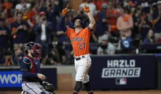 Houston Astros&#39; Jose Altuve celebrates after a home run during the seventh inning in Game 2 of baseball&#39;s World Series between the Houston Astros and the Atlanta Braves Wednesday, Oct. 27, 2021, in Houston. (AP Photo/David J. Phillip) **FILE**