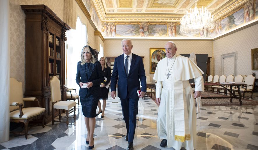 US President Joe Biden, first lady Jill Biden and Pope Francis walk as they meet at the Vatican, Friday, Oct. 29, 2021. President Joe Biden is set to meet with Pope Francis on Friday at the Vatican, where the worlds two most notable Roman Catholics plan to discuss the COVID-19 pandemic, climate change and poverty. The president takes pride in his Catholic faith, using it as moral guidepost to shape many of his social and economic policies. (Vatican Media via AP)