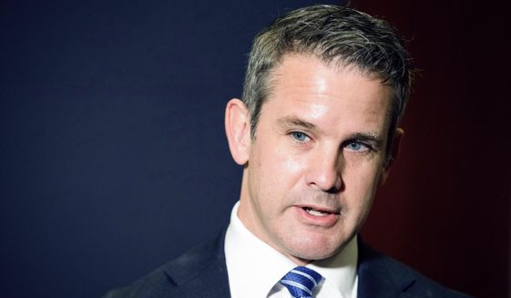 In this May 12, 2021, photo, Rep. Adam Kinzinger, R-Ill., speaks to the media at the Capitol in Washington. Kinzinger, a critic of Donald Trump who is one of two Republicans on the panel investigating the deadly Capitol attack, announced Friday, Oct. 29, that he will not seek reelection next year. (AP Photo/Amanda Andrade-Rhoades) **FILE**