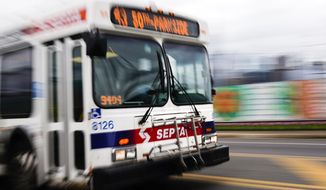 FILE—A Southeastern Pennsylvania Transportation Authority (SEPTA) bus is driven in Philadelphia, in this file photo from, Oct. 27, 2021. Members of Philadelphia&#39;s largest transit worker&#39;s union announced early Friday, Oct. 29, 2021 they reached a tentative contract agreement. The agreement has averted a possible strike that threatened to bring elevated trains, buses and trolleys to a halt and leave thousands of children and educators without a way to get to school next week. (AP Photo/Matt Rourke, File)