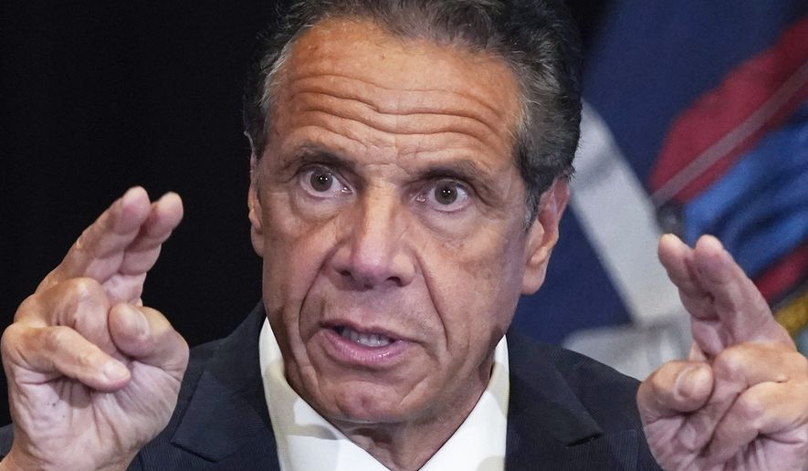 In this file photo, then-New York Gov. Andrew Cuomo speaks during a news conference at New York&#39;s Yankee Stadium, on July 26, 2021. Hundreds of pages of testimony about unwanted kisses, hugs and gropes from the investigation into sexual assault allegations against Mr. Cuomo were released by the New York attorney general&#39;s office on Nov. 10, 2021. (AP Photo/Richard Drew, File)  **FILE**