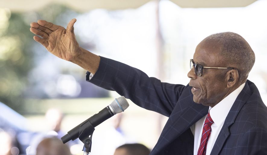 Fred Gray speaks to the audience at the Fred D. Gray Avenue dedication ceremony, Tuesday, Oct. 26, 2021, in Montgomery, Ala. The civil rights attorney was honored with his name on the road previously known as Jeff Davis Avenue. (AP Photo/Vasha Hunt) ** FILE **