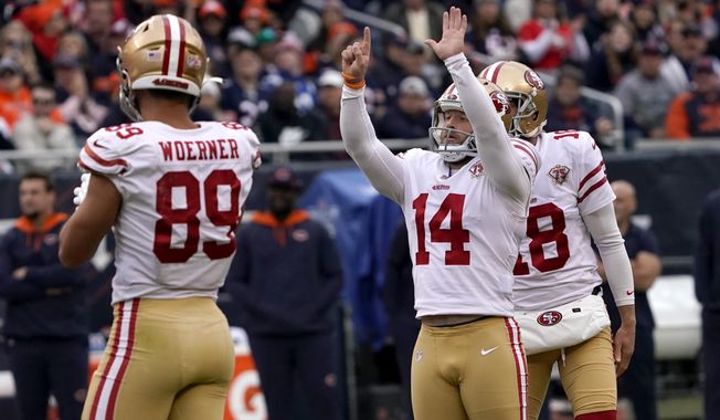 San Francisco 49ers kicker Joey Slye celebrates his field goal with Charlie Woerner (89) and Mitch Wishnowsky during the first half of an NFL football game against the Chicago Bears Sunday, Oct. 31, 2021, in Chicago. (AP Photo/David Banks) ** FILE **