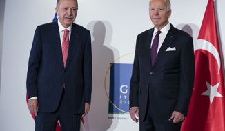 President Joe Biden meets with Turkish President Recep Tayyip Erdogan during the G20 leaders summit, Sunday, Oct. 31, 2021, in Rome. (AP Photo/Evan Vucci)