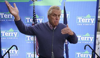 Democratic gubernatorial candidate former Virginia Gov. Terry McAuliffe gestures as he speaks to supporters during a rally in Richmond, Va., Sunday, Oct. 31, 2021. McAuliffe will face Republican Glenn Youngkin in the November election. (AP Photo/Steve Helber) **FILE**