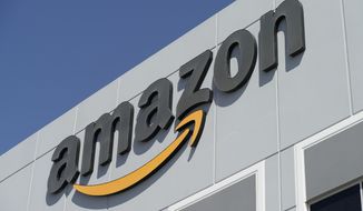 A sign at an Amazon Fulfillment Center is seen in North Las Vegas on March 31, 2021. Lawmakers are getting creative as they introduce a slew of bills intended to take Big Tech down a peg and the proposed legislation targeting personal data collected from young people could hit the bottom line of the social media companies. (AP Photo/John Locher) **FILE**