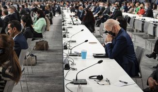 President Joe Biden attends the opening session of the COP26 U.N. Climate Summit, Monday, Nov. 1, 2021, in Glasgow, Scotland. (Erin Schaff/The New York Times via AP, Pool)
