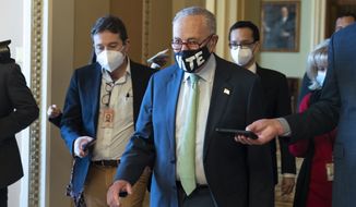 Senate Majority Leader Charles E. Schumer, New York Democrat, walks on Capitol Hill in Washington on Monday, Nov. 1, 2021, (AP Photo/Alex Brandon) **FILE**