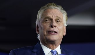 Democratic gubernatorial candidate Terry McAuliffe speaks at an election night party in McLean, Va., Tuesday, Nov. 2, 2021. Voters are deciding between Democrat Terry McAuliffe and Republican Glenn Youngkin. (AP Photo/Steve Helber)
