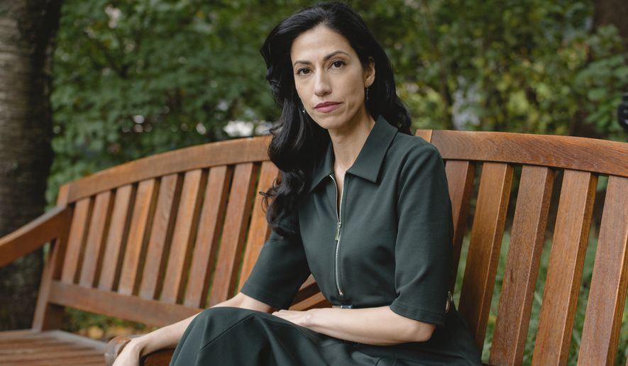 Huma Abedin poses for a portrait at a park in New York to promote her memoir &quot;Both/And: A Life in Many Worlds&quot; on Wednesday, Oct. 27, 2021. (Photo by Christopher Smith/Invision/AP)