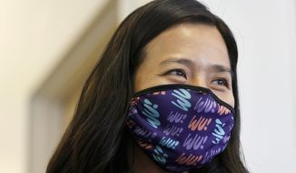 Boston mayoral candidate Michelle Wu visits her campaign headquarters ahead of tomorrow&#39;s citywide election, Monday, Nov. 1, 2021, in the Jamaica Plain neighborhood of Boston. (AP Photo/Mary Schwalm)
