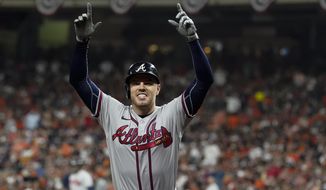 Atlanta Braves&#39; Freddie Freeman celebrates his home run during the seventh inning in Game 6 of baseball&#39;s World Series between the Houston Astros and the Atlanta Braves Tuesday, Nov. 2, 2021, in Houston.(AP Photo/Eric Gay)