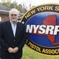 New York State Rifle &amp; Pistol Association President Tom King poses for a photo Oct. 28, 2021, in East Greenbush, N.Y. The Supreme Court is set to hear arguments Wednesday, Nov. 3, in a gun rights case that centers on New York’s restrictive gun permit law and whether limits the state has placed on carrying a gun in public violate the Second Amendment. Gun rights advocates including the New York State Rifle &amp; Pistol Association and two private citizens are challenging the law. (AP Photo/Hans Pennink, File)