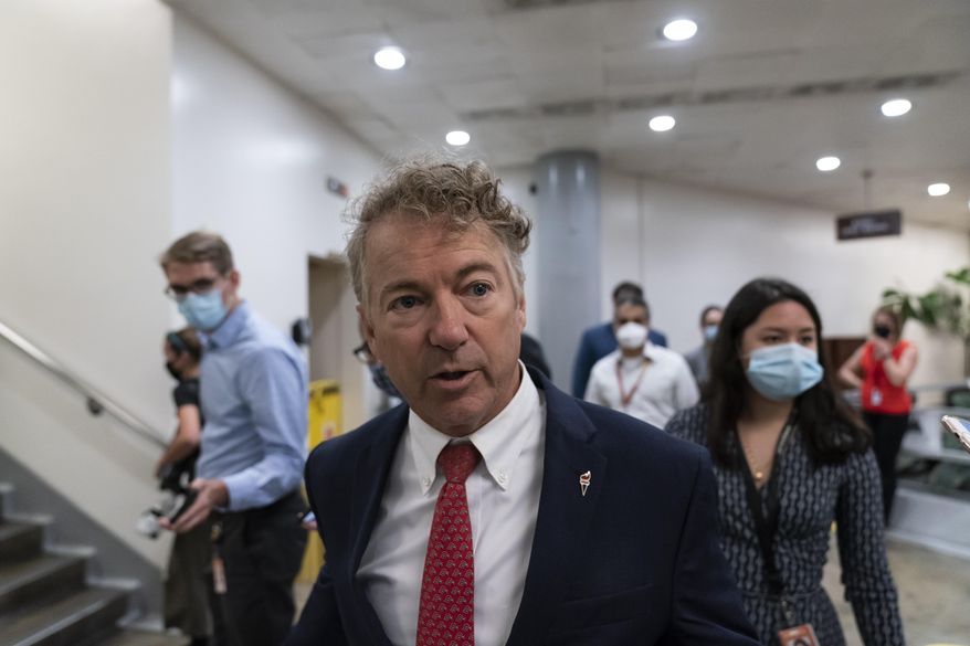 Sen. Rand Paul, R-Ky., speaks with reporters as he walks on Capitol Hill, Thursday, Oct. 7, 2021, in Washington. (AP Photo/Alex Brandon) **FILE**