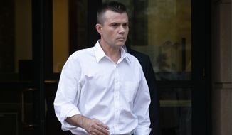 Igor Danchenko leaves the Albert V. Bryan United States Courthouse in Alexandria, Va., Thursday, Nov. 4, 2021. Danchenko, a Russian analyst who contributed to a dossier of Democratic-funded research into ties between Russia and Donald Trump, was arrested Thursday on charges of lying to the FBI about his sources of information, among them an associate of Hillary Clinton. (AP Photo/Manuel Balce Ceneta)