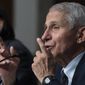 Dr. Anthony Fauci, right, director of the National Institute of Allergy and Infectious Diseases, speaks during a Senate Health, Education, Labor, and Pensions Committee hearing on Capitol Hill, Thursday, Nov. 4, 2021, in Washington. (AP Photo/Alex Brandon)
