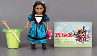 This photo, provided by The Strong National Museum of Play, shows the three toys being inducted this year into the National Toy Hall of Fame. They are, from left: sand, The American Girl Doll, and the game of Risk, that are being enshrined during a ceremony at the hall, located inside The Strong National Museum of Play, in Rochester, NY. (Strong National Museum of Play/Victoria Gray via AP)