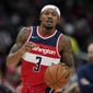 Washington Wizards guard Bradley Beal drives the ball in the second half of an NBA basketball game against the Memphis Grizzlies, Friday, Nov. 5, 2021, in Washington. (AP Photo/Patrick Semansky)