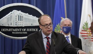 Acting Assistant U.S. Attorney General Jeffrey Clark speaks as he stands next to Deputy Attorney General Jeffrey A. Rosen during a news conference at the Justice Department in Washington, Oct. 21, 2020. Clark, who aligned himself with former President Donald Trump after he lost the 2020 election has declined to be fully interviewed by a House committee investigating the Jan. 6 Capitol insurrection, ending a deposition after around 90 minutes on Friday, Nov. 5. (Yuri Gripas/Pool via AP) **FILE**