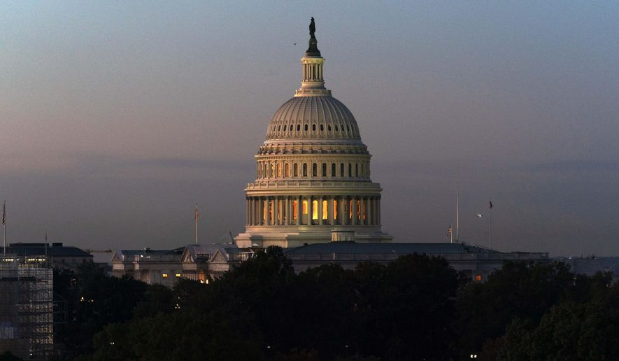 The U.S. Capitol is seen on a sunrise in Washington, Friday, Nov. 5, 2021. (AP Photo/Jose Luis Magana) ** FILE **