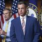 Rep. Jim Banks, R-Ind., right, and Rep. Jim Jordan, R-Ohio, left, exchange places at the podium during a news conference at the Capitol in Washington, Wednesday, July 21, 2021. Banks and another Republican lawmaker are calling on Democrats on the committee investigating the Jan. 6, 2021 attack on the U.S. Capitol to release staff reports, saying the disclosures are required by House rules. (AP Photo/J. Scott Applewhite, File)