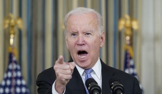 President Joe Biden responds to a question about the U.S. border as he speaks in the State Dining Room of the White House, Saturday, Nov. 6, 2021, in Washington. (AP Photo/Alex Brandon)