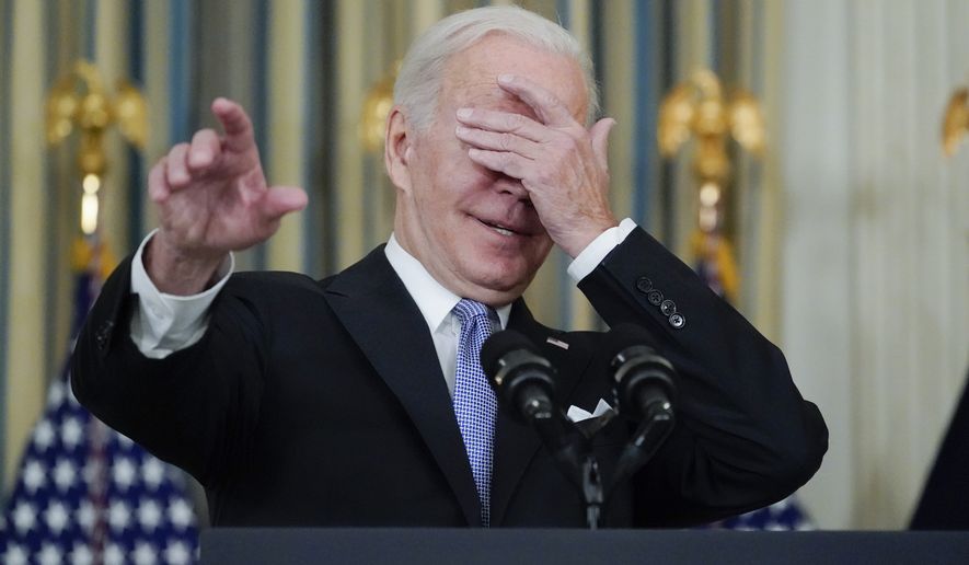 President Joe Biden jokes about which reporter to call on for a question as he speaks about the bipartisan infrastructure bill in the State Dinning Room of the White House, Saturday, Nov. 6, 2021, in Washington. (AP Photo/Alex Brandon)
