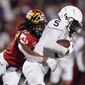 Penn State wide receiver Jahan Dotson, right, is tackled by Maryland defensive back Tarheeb Still after making a catch during the second half of an NCAA college football game, Saturday, Nov. 6, 2021, in College Park, Md. Penn State won 31-14. (AP Photo/Julio Cortez)