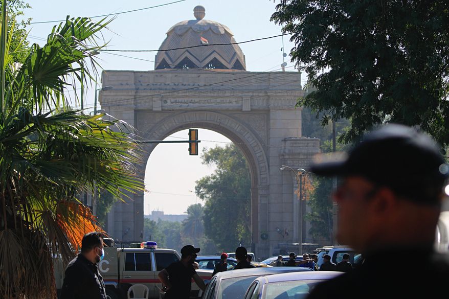 Iraqi Security forces close the heavily fortified Green Zone as they tightened security measures hours after an assassination attempt on Prime Minister Mustafa al-Kadhimi, in Baghdad, Iraq, Sunday, Nov. 7, 2021. Al-Kadhimi survived the attack by armed drones that targeted his residence early Sunday and officials said he escaped unharmed. (AP Photo/Hadi Mizban)
