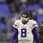 Minnesota Vikings quarterback Kirk Cousins (8) walks off the field after an NFL football game against the Baltimore Ravens, Sunday, Nov. 7, 2021, in Baltimore. (AP Photo/Julio Cortez)