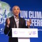 Former U.S. President Barack Obama gestures as he speaks during the COP26 U.N. Climate Summit in Glasgow, Scotland, Monday, Nov. 8, 2021. The U.N. climate summit in Glasgow is entering its second week as leaders from around the world, are gathering in Scotland&#39;s biggest city, to lay out their vision for addressing the common challenge of global warming. (Jane Barlow/PA via AP)
