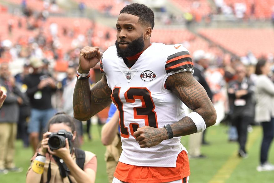 Cleveland Browns wide receiver Odell Beckham Jr. walks on the field after an NFL football game against the Chicago Bears on Sept. 26, 2021, in Cleveland. A disappointment and distraction before being released by the Browns, Beckham cleared NFL waivers without being claimed Tuesday, Nov. 9, 2021, and can now sign as a free agent with any team. (AP Photo/David Richard, File)