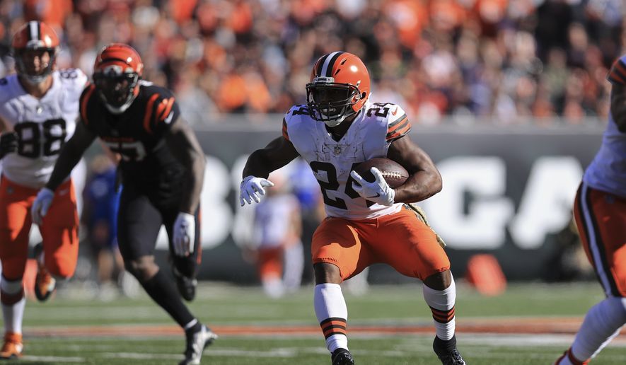 Cleveland Browns&#39; Nick Chubb (24) runs during the first half of an NFL football game against the Cincinnati Bengals, Sunday, Nov. 7, 2021, in Cincinnati. (AP Photo/Aaron Doster) **FILE**