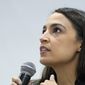 U.S. Rep. Alexandria Ocasio-Cortez speaks at an event at the US Climate Action Center at the COP26 U.N. Climate Summit in Glasgow, Scotland, Tuesday, Nov. 9, 2021. (AP Photo/Alastair Grant) **FILE**