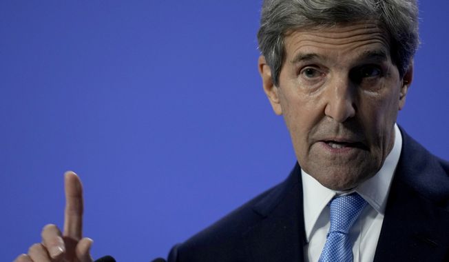 John Kerry, United States Special Presidential Envoy for Climate speaks immediately after a press conference given by China&#x27;s Special Envoy for Climate Change Xie Zhenhua at the COP26 U.N. Climate Summit, in Glasgow, Scotland, Wednesday, Nov. 10, 2021. The U.N. climate summit in Glasgow has entered its second week as leaders from around the world, are gathering in Scotland&#x27;s biggest city, to lay out their vision for addressing the common challenge of global warming. (AP Photo/Alastair Grant)