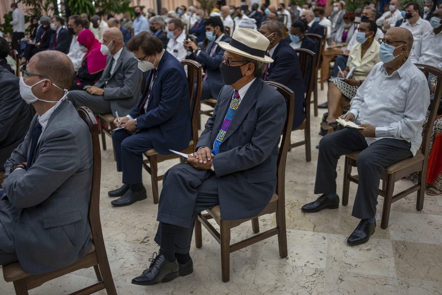 Foreign diplomats listen to Cuban Foreign Minister Bruno Rodriguez in Havana, Cuba, Wednesday, Nov. 10, 2021. The Cuban Foreign Ministry summoned hundreds of foreign diplomats to a meeting and accused the U.S. government of instigating a planned opposition demonstration that local authorities have banned. (AP Photo/Ramon Espinosa)