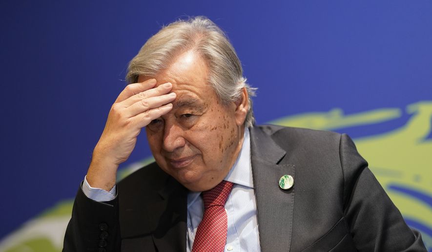 U.N. Secretary-General Antonio Guterres gestures during an interview at the COP26 U.N. Climate Summit in Glasgow, Scotland, Thursday, Nov. 11, 2021. Guterres says the Paris temperature goal of limiting warming to 1.5 degrees &quot;is on life support&quot; with climate talks so far not reaching any of the U.N.&#39;s three goals, however &quot;until the last moment hope should be maintained.&quot; (AP Photo/Alberto Pezzali)