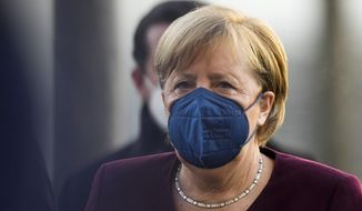 German Chancellor Angela Merkel arrives for a debate about the measures to battle the coronavirus and COVID-19 at the parliament Bundestag in Berlin, Germany, Thursday, Nov. 11, 2021. Germany&#39;s national disease control center reported a record-high number of more than 50,000 daily coronavirus cases on Thursday as the country&#39;s parliament was set to discuss legislation that would provide a new legal framework for coronavirus measures.(Photo/Markus Schreiber)