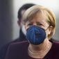 German Chancellor Angela Merkel arrives for a debate about the measures to battle the coronavirus and COVID-19 at the parliament Bundestag in Berlin, Germany, Thursday, Nov. 11, 2021. Germany&#x27;s national disease control center reported a record-high number of more than 50,000 daily coronavirus cases on Thursday as the country&#x27;s parliament was set to discuss legislation that would provide a new legal framework for coronavirus measures.(Photo/Markus Schreiber)