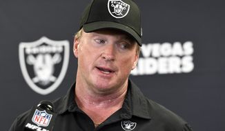 Las Vegas Raiders head coach Jon Gruden speaks with the media following an NFL football game against the Pittsburgh Steelers in Pittsburgh on Sept. 19, 2021. The former Raiders coach has sued Commissioner Roger Goodell and the NFL, alleging that a “malicious and orchestrated campaign” was used to destroy his career by leaking old offensive emails from him. The suit was filed in district court in Clark County, Nev., on Thursday, Nov. 11, 2021, exactly a month after Gruden resigned as Raiders coach following the publication of his emails by the Wall Street Journal and The New York Times. (AP Photo/Don Wright, File)