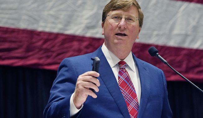 Mississippi Gov. Tate Reeves addresses business leaders at the Mississippi Economic Council&#x27;s annual &amp;quot;Hobnob Mississippi&amp;quot; in Jackson, Miss., Thursday, Oct. 28, 2021. (AP Photo/Rogelio V. Solis)