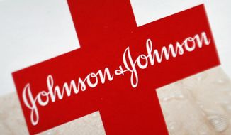 This Oct. 16, 2012, file photo shows the Johnson &amp;amp; Johnson logo on a package of Band-Aids, in St. Petersburg, Fla. Johnson &amp;amp; Johnson is splitting into two companies, separating the division that sells Band-Aids and Listerine from its medical device and prescription drug business. The company selling prescription drugs and medical devices will keep Johnson &amp;amp; Johnson as its name, the company said Friday, Nov. 12, 2021. (AP Photo/Chris O&#39;Meara, File)