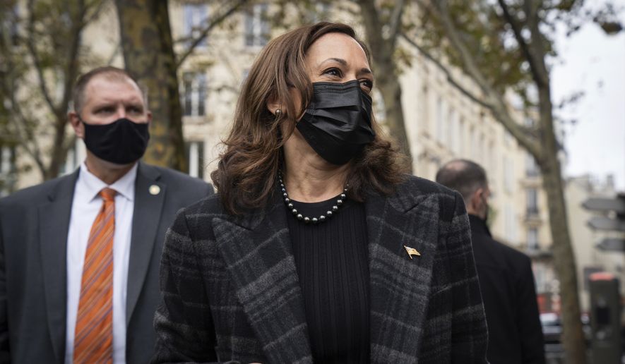 Vice President Kamala Harris stops to talk with reporters after shopping for pots at E. Dehillerin Cookware Shop in Paris, France, Saturday, Nov. 13, 2021. (Sarahbeth Maney/The New York Times via AP, Pool)
